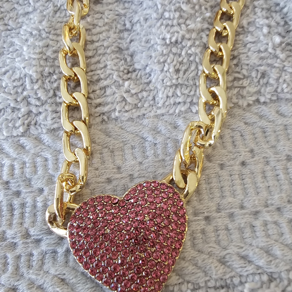 Radiant Gold Necklace with Pink Heart Pendant